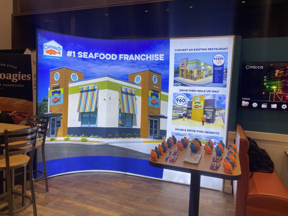 Lots of squish fish on display at a conference.