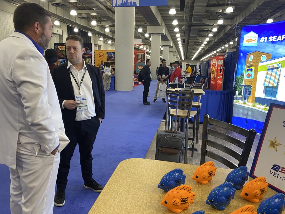 Squish fish on a table at a conference.